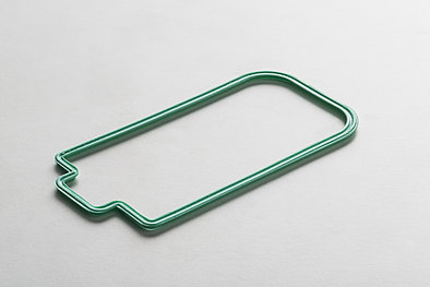 The picture shows a turquoise silicone gasket