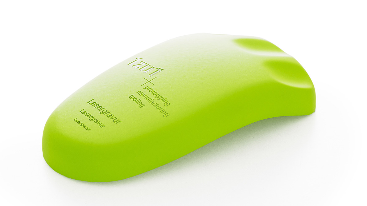 Green plastic mouse with 1zu1 logo as laser engraving